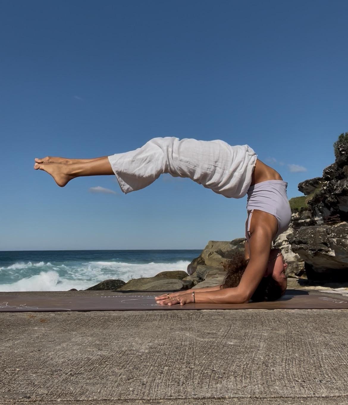 Yoga pose by the ocean