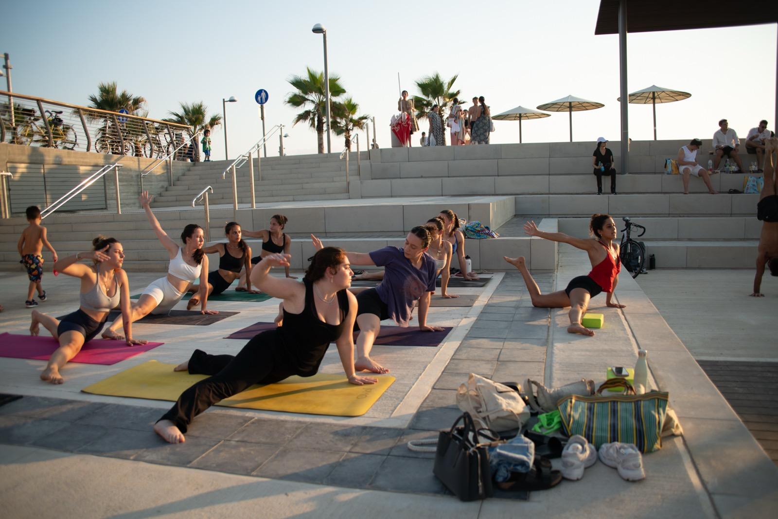 Yoga class on the beach
